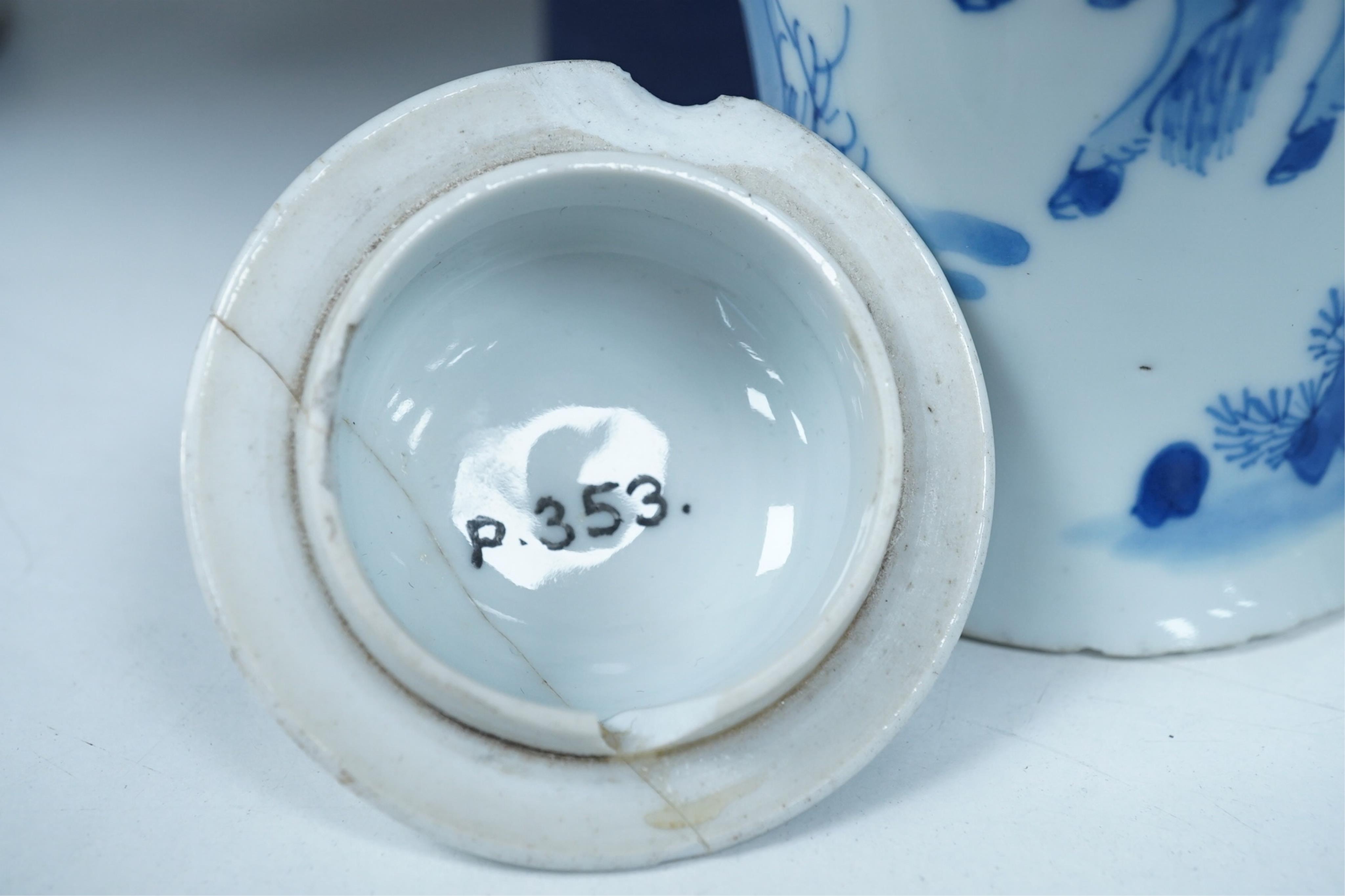 A Chinese blue and white baluster vase, early Kangxi, and associated cover